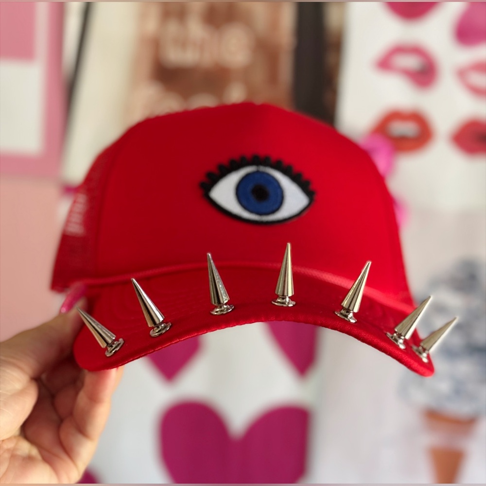 Watchful Edge Trucker Hat – Red Hat with Evil Eye Patch & Silver Spikes